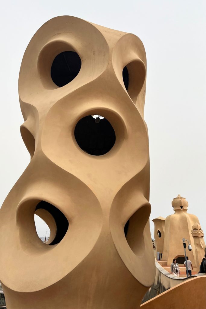 Close-up of Casa Milà rooftop chimney sculpture on La Pedrera terrace
