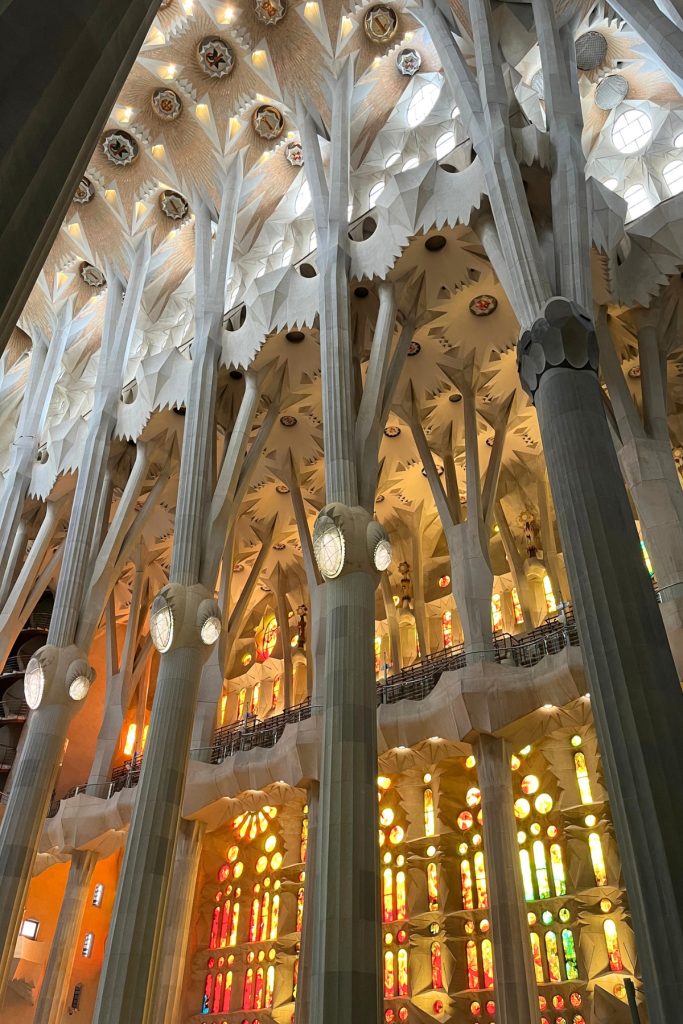 Sagrada Família stained glass window in red, orange, and gold tones