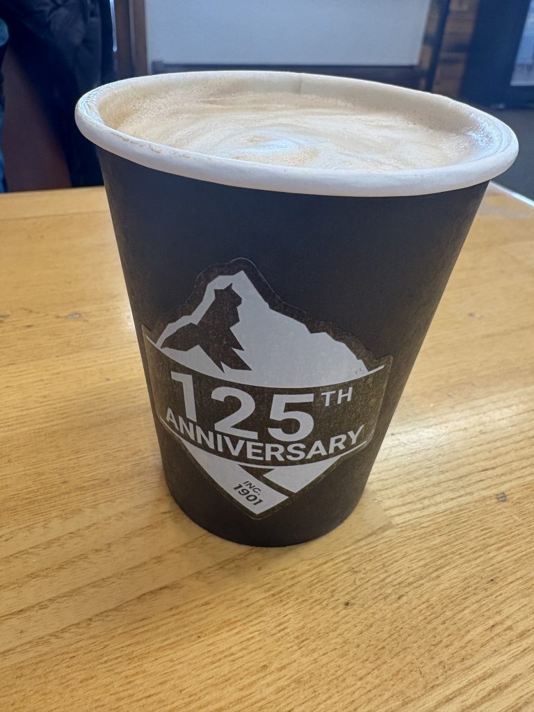 Coffee cup with Valdez 125th anniversary logo, incorporated 1901