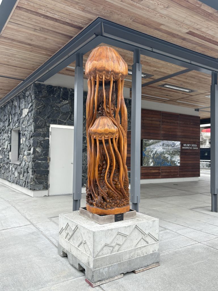 Carved wooden jellyfish sculpture titled "Eternity" at the Valdez cruise terminal
