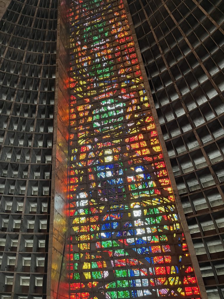 Close-up of vividly colored stained glass inside the Metropolitan Cathedral of Rio de Janeiro