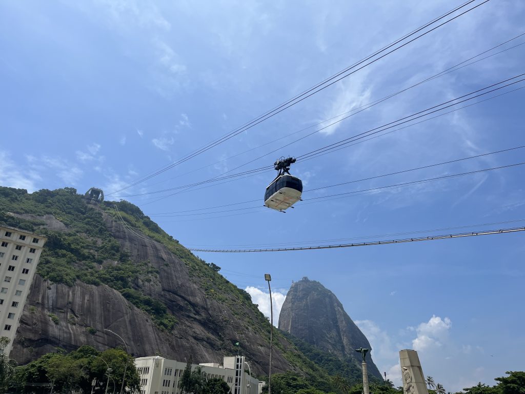 Sugarloaf Mountain cable car in transit against the granite peak in Rio de Janeiro