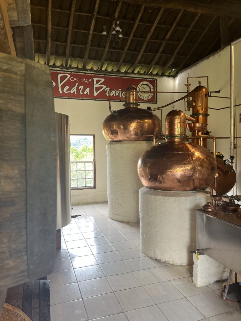Copper distillation stills inside the Pedra Branca cachaça distillery in Paraty, Brazil