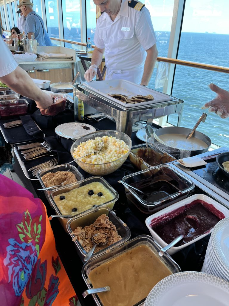 Buffet spread of pancakes, syrups, and toppings on a cruise ship for Shrove Tuesday