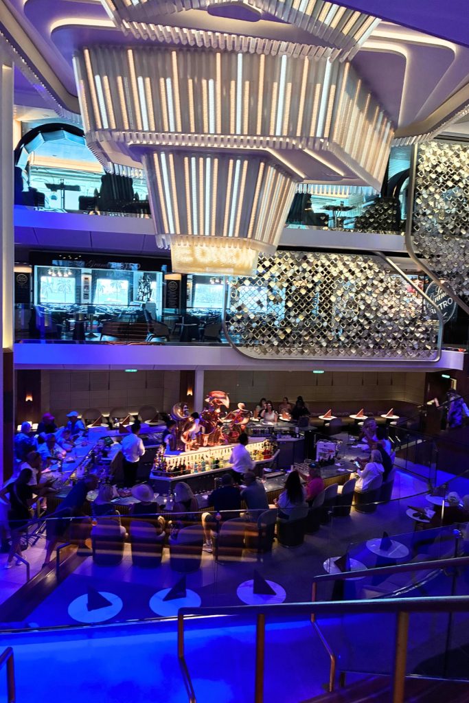 Celebrity Beyond Martini Bar with illuminated LED chandelier and mosaic wall backdrop