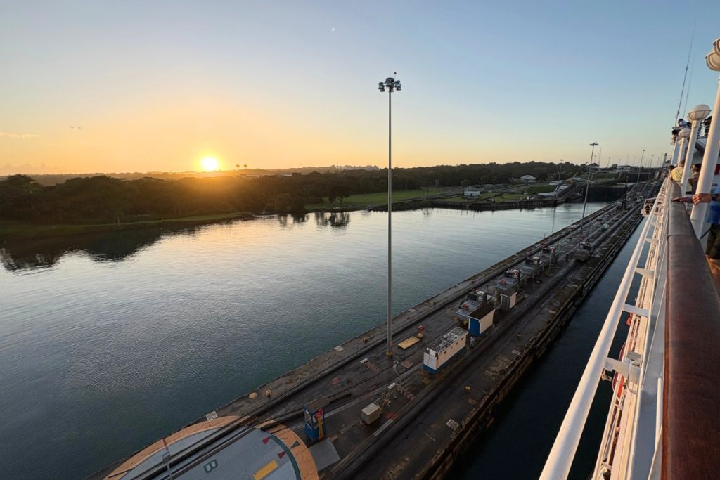 Sunrise over the Panama Canal, viewed from the deck of a cruise ship passing through the locks