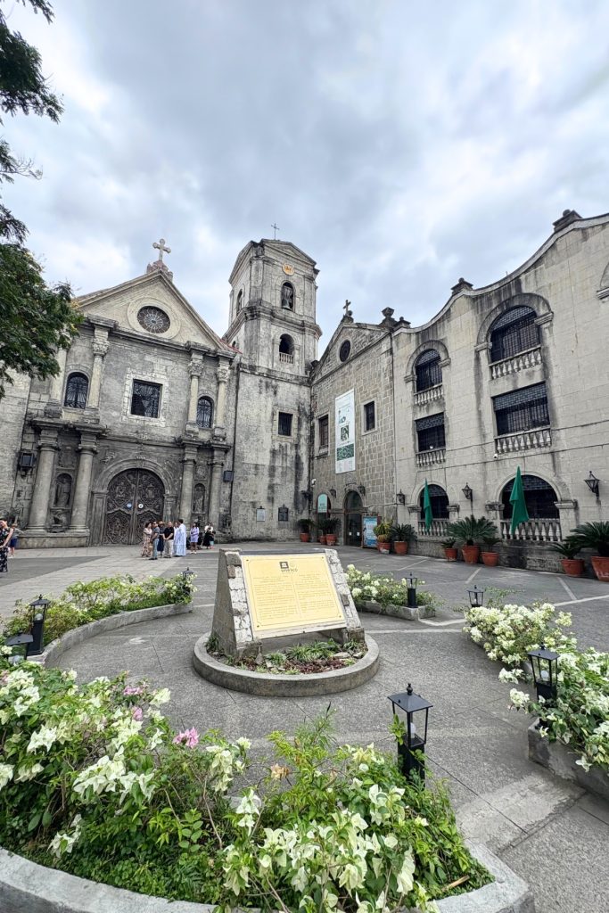 Stone facade and bell tower of San Agustin Church in Intramuros, Manila, the oldest stone church in the Philippines